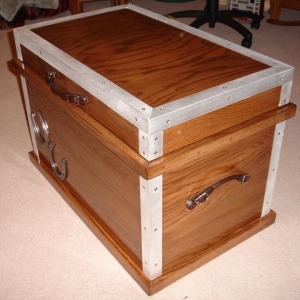 Just a side view of the tack box.  It has brushed aluminum edging on it for looks and durability.  The handles are a part of the bridal, not sure what it's called, but thought they looked cool as handles.