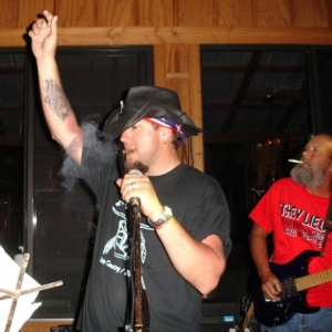Taken at a motorcycle rally that we go to in NC every spring.  There's a band called Ambush (southern rock & country) that plays every year, and I always get to sing with them.