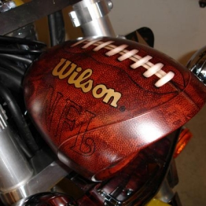 Headlight on my VTX.  This is the stock headlight painted.  The shape of the headlight, if looked at from the side has a remarkable resemblance to a football.