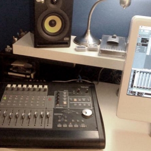 Tascam FW-1082 mixer/audio interface/DAW controller
Apple iMac running Cubase LE4 DAW software
KRK Rockit 5 monitor