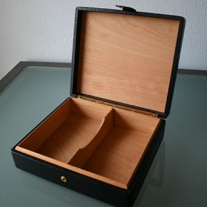 Leather travel humidor, open. Spanish cedar inside.