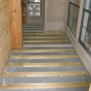 Treated floor supports to allow an air space beneath the flooring. I want as much exposed cedar surface as possible for a good RH buffer