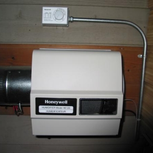 Humidifier & Humidistat. Connected to a "soft" water line I never have to worry about it. I highly recommend this unit for a walkin up to 1000sqft. Also, most importantly, it is a true evaporative type and won't create "white dust fallout".