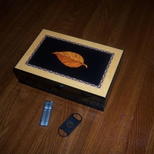 Here is my humidor with a leaf inlay.