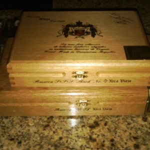 Boxes of Anejo 55 and 77 sharks