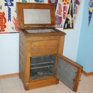 Ice Box.  I took the zinc off of the inside of the top lid, and the inside of the door.  I'll be replacing it with Spanish Cedar.