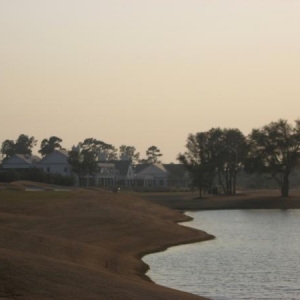 18 with the club house in the background