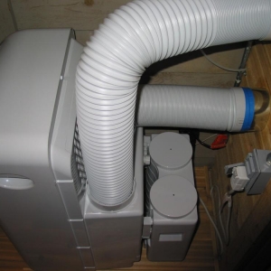 Danby A/C installation. Being self-contained, the condenser exhaust/supply is ducted in/out as a closed loop. Very nice unit, well constructed.