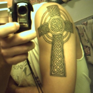 Celtic cross tattoo on my right shoulder/arm.