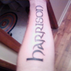 My son's name on my left fore arm.