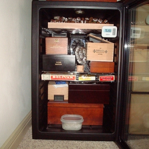 Day 1: Arranging and re-arranging the various containers. I was glad to have a few empties from my local B&Ms. I was able to empty three 6-pack coolers and about half of a 300ct humidor.  Precedence was given the Tatuaje, Liga Privada, Arturo Fuente, RyJ, Pepin and cc's that I had. The aroma when it's opened is awesome!