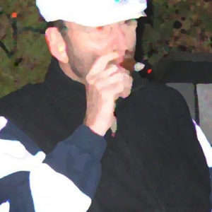 Several years ago smoking on the roof of my urban retreat in Minneapolis.