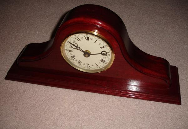 A solid purple heart wood tambour clock I made for Linda.  I do not recommend working with this devil's wood, will never work with it again, and am glad this damn thing is done!