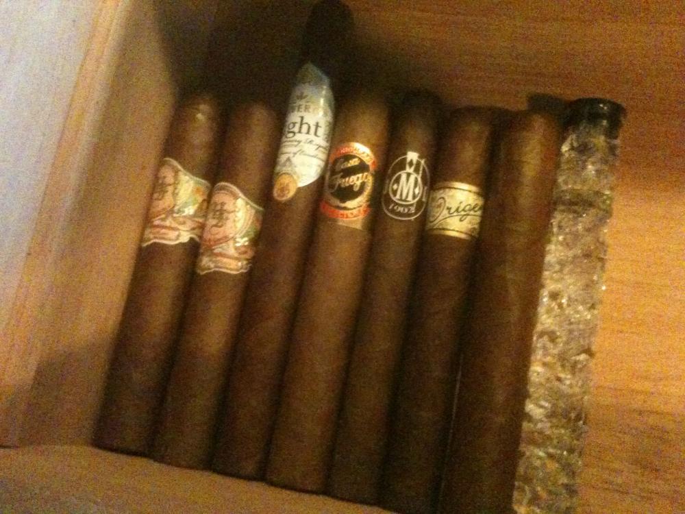 Bottom of the Humidor. The two My Fathers on the left were already part of my stash, in anticipation for Father's Day. I wonder what that unbanded cigar all the way on the right is.... hmmmm....
