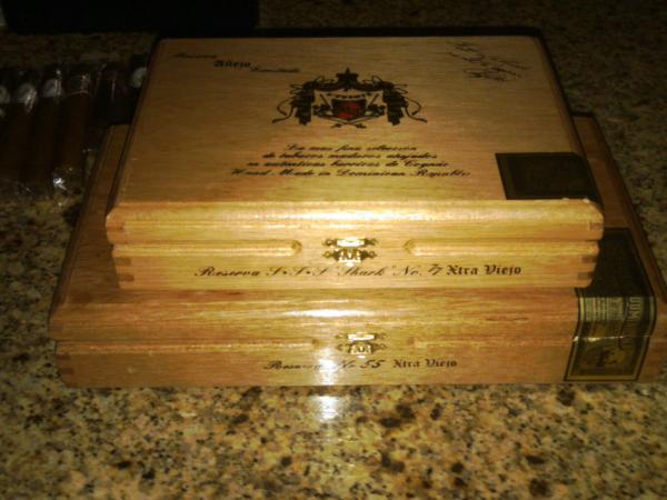 Boxes of Anejo 55 and 77 sharks