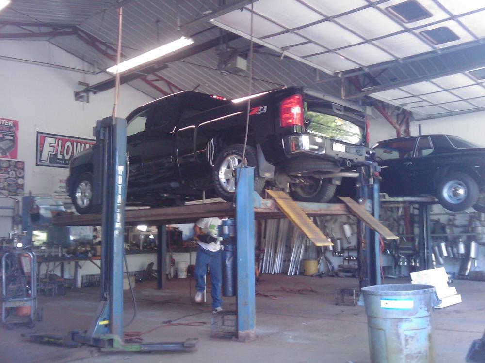 Custom bent stainless steel dual exhaust with Flowmaster 40 muffler.