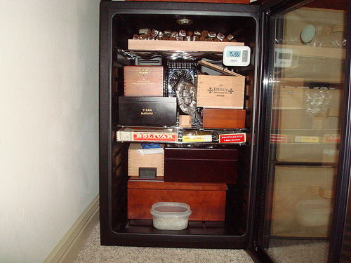 Day 1: Arranging and re-arranging the various containers. I was glad to have a few empties from my local B&Ms. I was able to empty three 6-pack coolers and about half of a 300ct humidor.  Precedence was given the Tatuaje, Liga Privada, Arturo Fuente, RyJ, Pepin and cc's that I had. The aroma when it's opened is awesome!