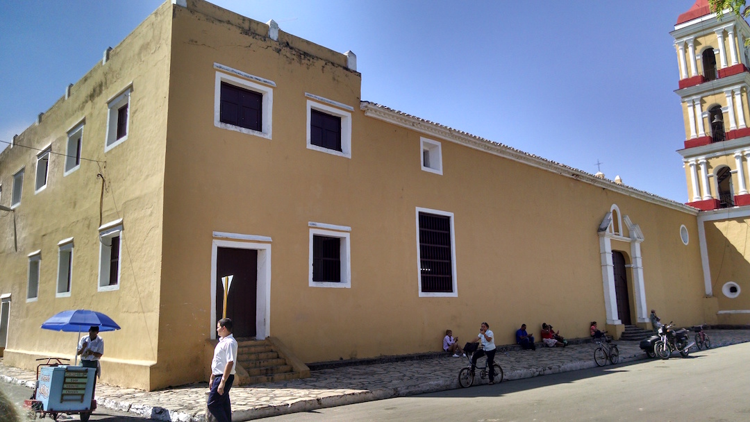Ice Cream Vendor On Corner Of A Church