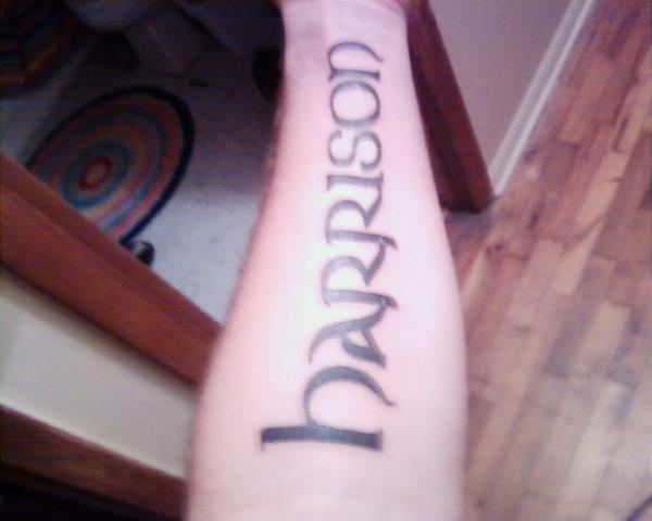 My son's name on my left fore arm.