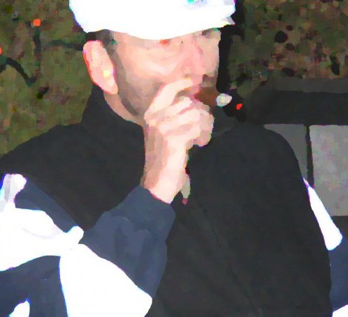 Several years ago smoking on the roof of my urban retreat in Minneapolis.