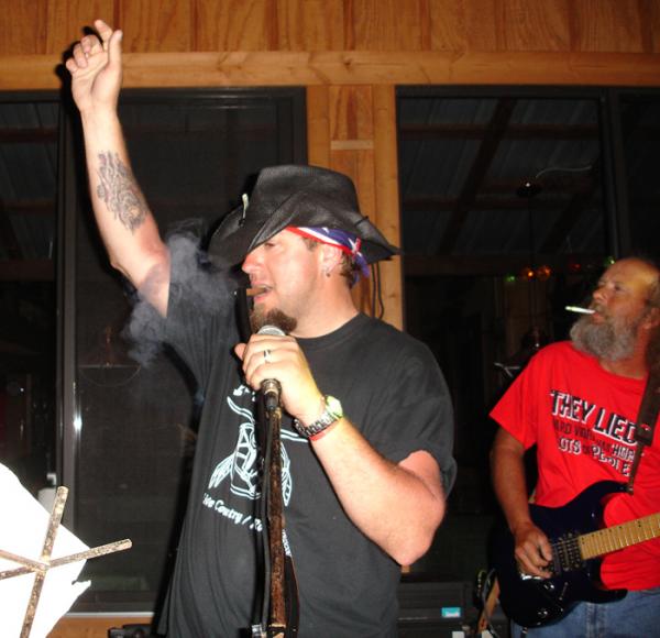 Taken at a motorcycle rally that we go to in NC every spring.  There's a band called Ambush (southern rock & country) that plays every year, and I always get to sing with them.