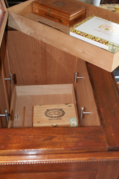 When you lift the lid, the top section has two 12" x 20" x 3" deep trays that sit on the stainless steel cabinet pulls I'm using for support.  The guys at Iwan Reis Cigar Co. in Chicago gave me the trays.  This is the section where the ice block used to go into.  It is open to the section below.